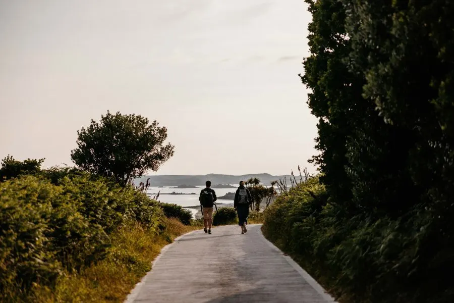 A traveller exploring the coastline during the summer Isles of Scilly campaign