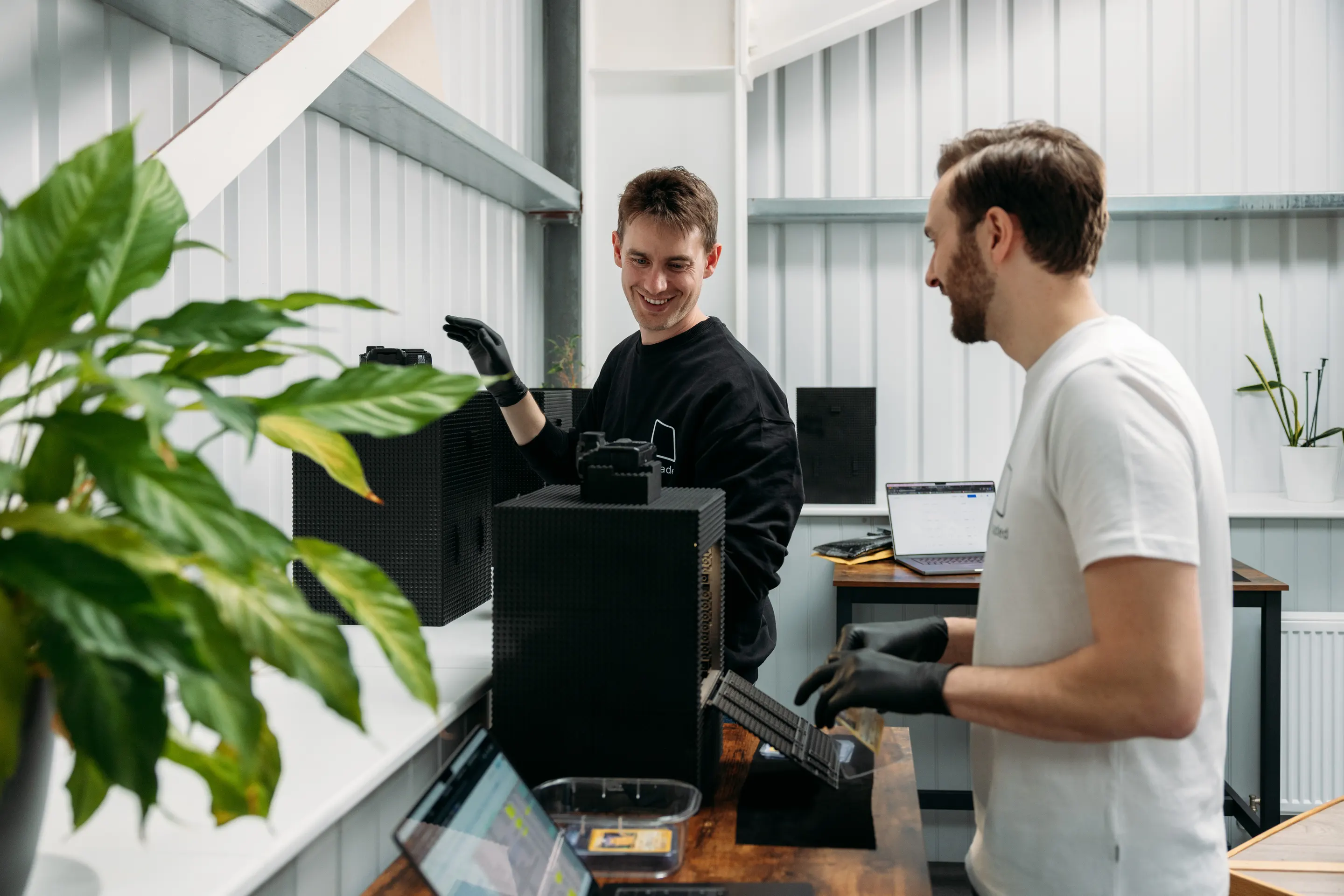Ungraded founders Josh and John working beside their 3D trading card imaging equipment during the launch campaign