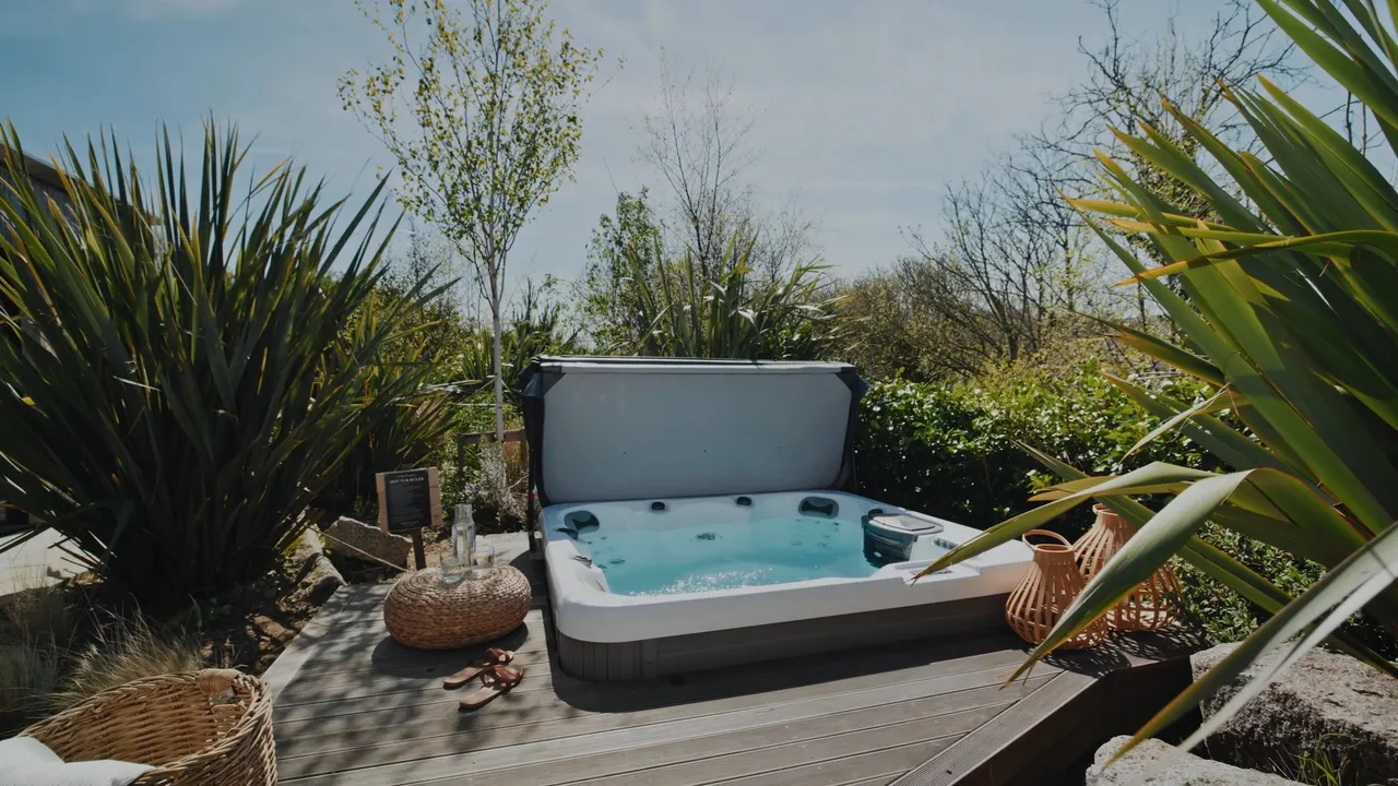 Vertical social frame from Kew House: the hot tub among the garden planting